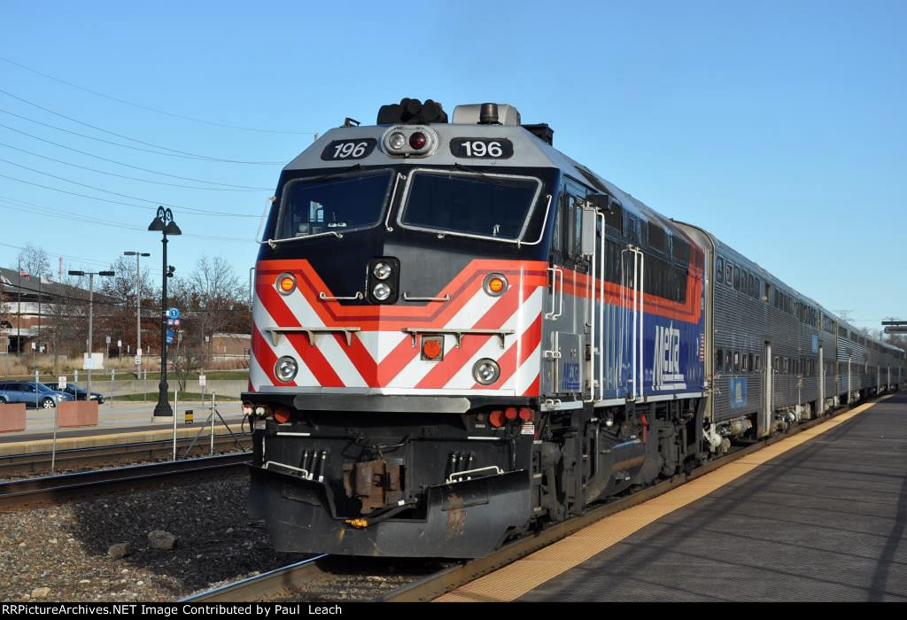 Commuter comes east into the station